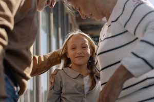 Can a Minor Inherit Directly, image of grandparents with little girl